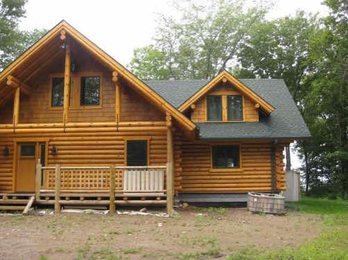 The log home before the garage addition is started